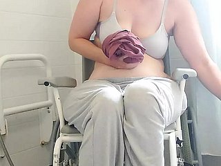 Paraplegic unlit Purplewheelz British milf peeing in rub-down the shower